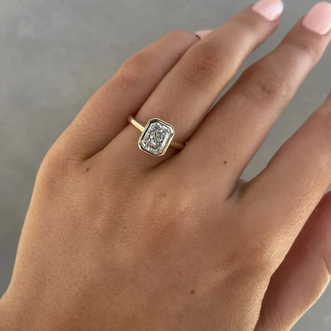 /public/photos/live/Ice Crushed Radiant Cut Bezel Set Moissanite Ring 631 (4).webp